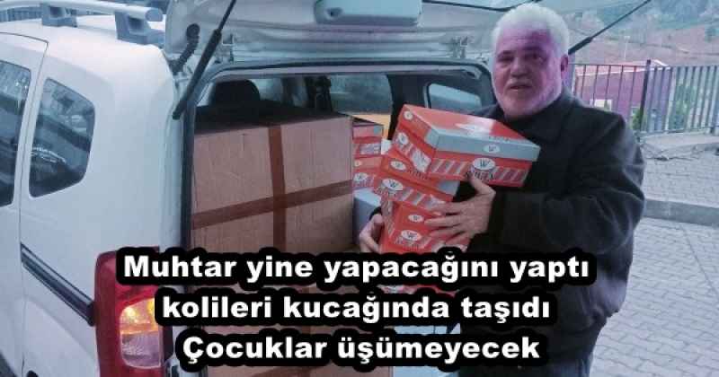 Muhtar yine yapacağını yaptı kolileri kucağında taşıdı Çocuklar üşümeyecek