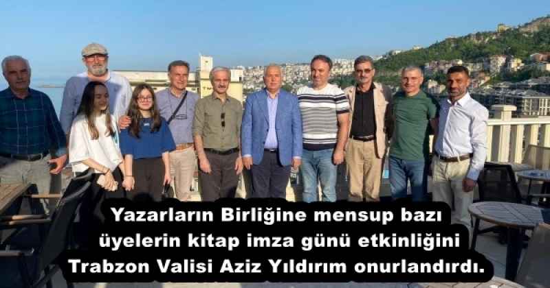 yazarlarin_birligine_mensup_bazi_uyelerin_kitap_imza_gunu_etkinligini_trabzon_valisi_aziz_yildirim_onurlandirdi_h53223_cffbf Yazarların Birliğine mensup bazı üyelerin kitap imza günü etkinliğini Trabzon Valisi Aziz Yıldırım onurlandırdı.