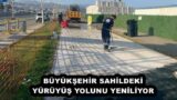 BÜYÜKŞEHİR SAHİLDEKİ YÜRÜYÜŞ YOLUNU YENİLİYOR 